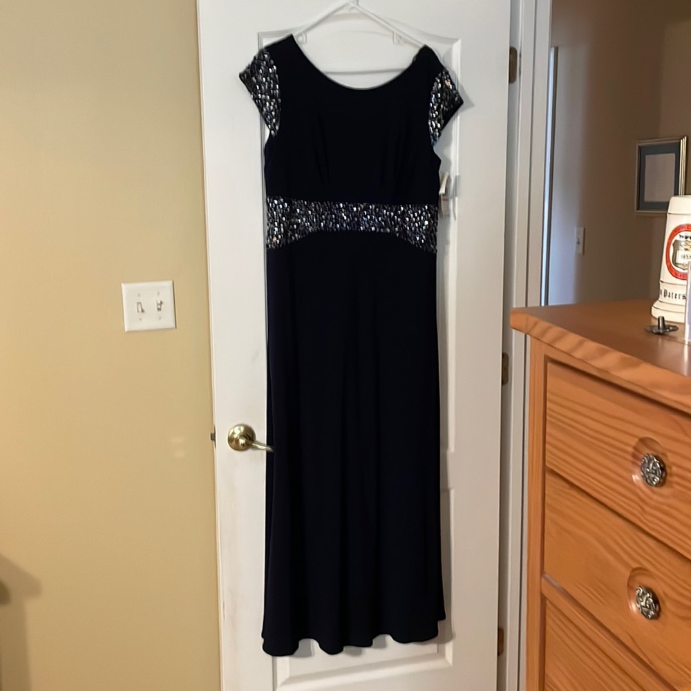Alex Evenings gown. Size 14. New with tags. Dark navy beading-sleeves /waist.